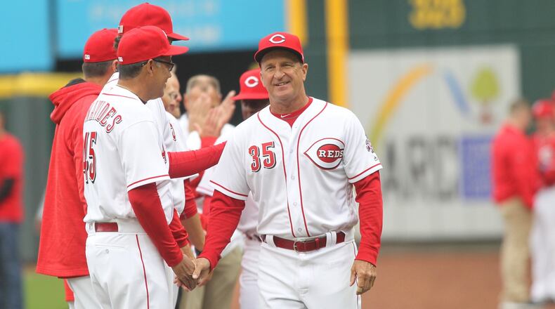 The Reds haven’t been the same since Jim Riggleman (right) was promoted to manager following a 3-15 start. David Jablonski/Staff