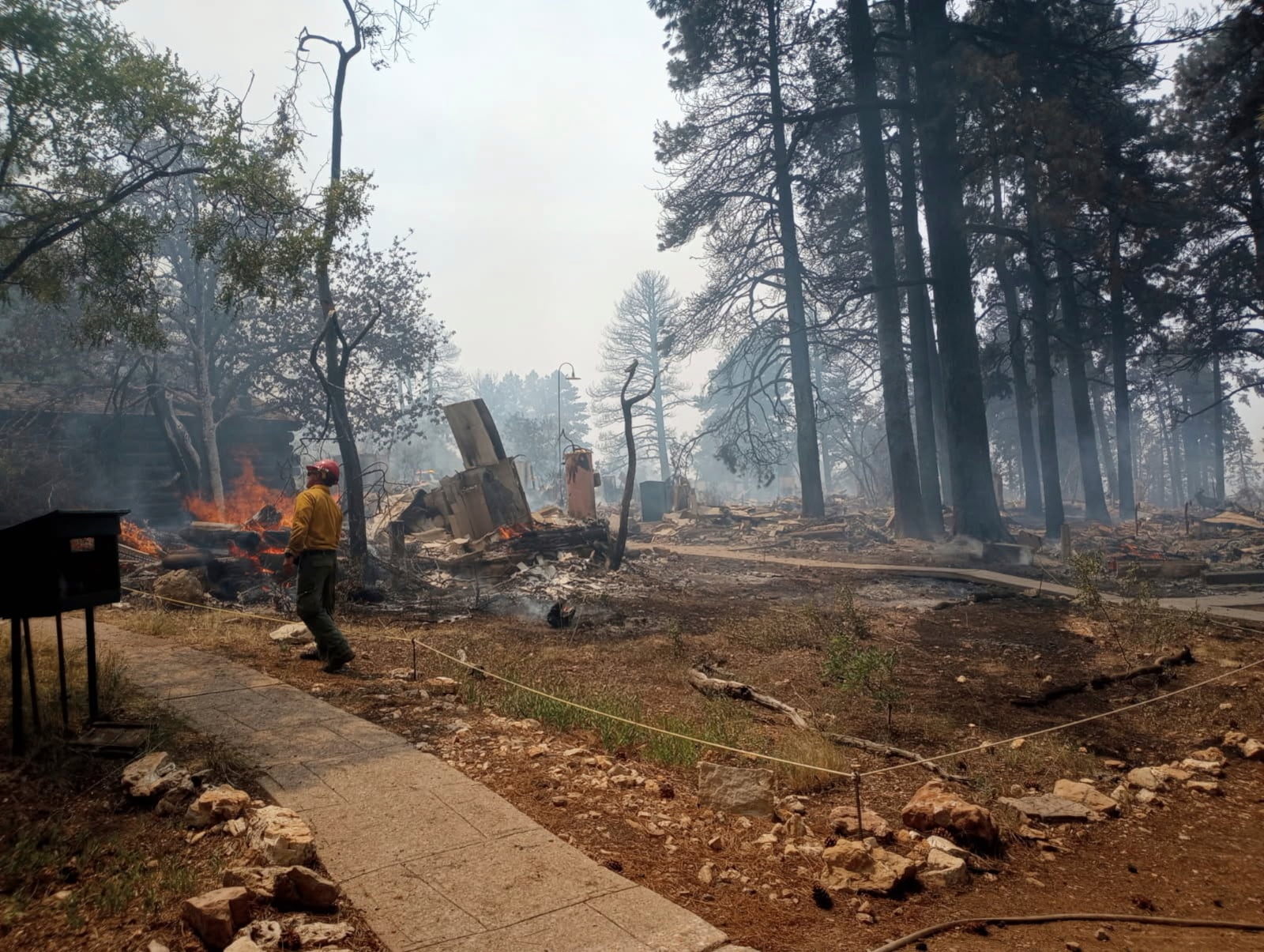 This photo provided by National Park Service shows the charred remains of a building at the North Rim of Grand Canyon National Park, in northern Arizona, on Sunday, July 13, 2025. (National Park Service via AP)