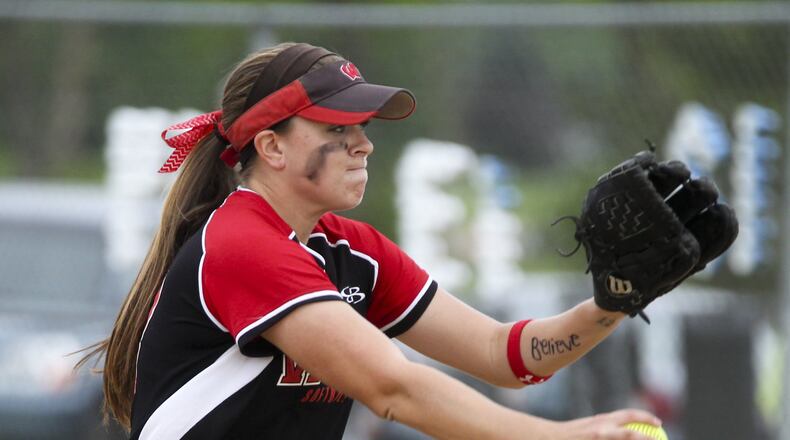 Lakota West pitcher Ashley Sharp winds up during a 2-1 victory over Mason on May 9, 2014. GREG LYNCH/STAFF