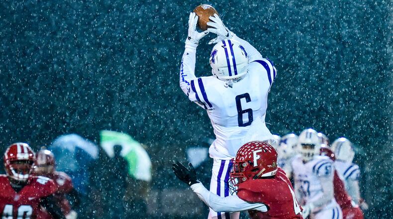 Middletown's EJ Hill jumps up for a catch during their football game against Fairfield last season.