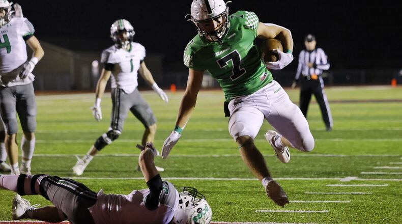 Badin's Zach Yordy runs in for a touchdown during their D-III regional football final against Celina Friday, Nov. 17, 2023 at Trotwood-Madison High School. Celina won 37-25. NICK GRAHAM/STAFF
