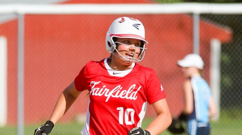 Fairfield’s Jordan Shotwell (10) rounds the bases and is congratulated by teammates after hitting a home run during their game against Mount Notre Dame at Fairfield on April 25, 2017. The host Indians won 15-2. GREG LYNCH/STAFF