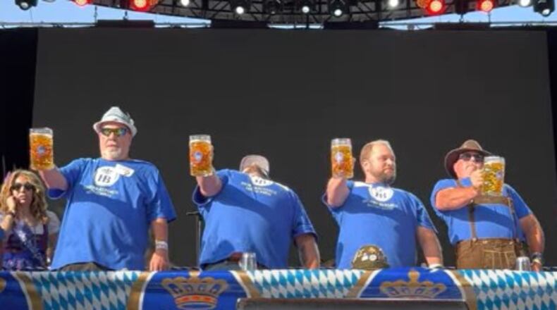 Kim Planert, left, competes in the 2022 Hofbräu USA Lenny Coyne Memorial Masskrugstemmen Men’s Championship U.S. Steinholding Match. CONTRIBUTED