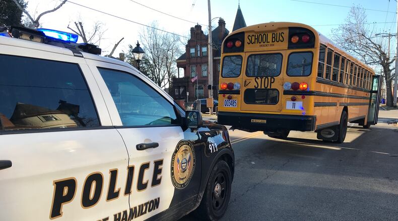 Hamilton emergency crews respond to the scene of a minor crash involving a school bus this morning, Friday, Feb. 2, 2018. NICK GRAHAM / STAFF