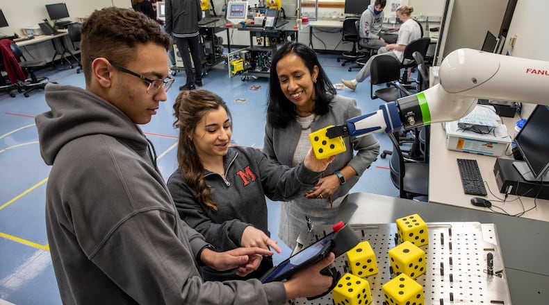 Miami University officials tout a recent $308,750 state grant for helping them to better teach their students about robotics and manufacturing. Officials at the university said the state funding gift from the Ohio Department of Higher Education will expand Miami’s role in feeding the employee pipeline with much-needed graduates to fill the region’s manufacturing workforce needs. (Provided Photo\Journal-News)