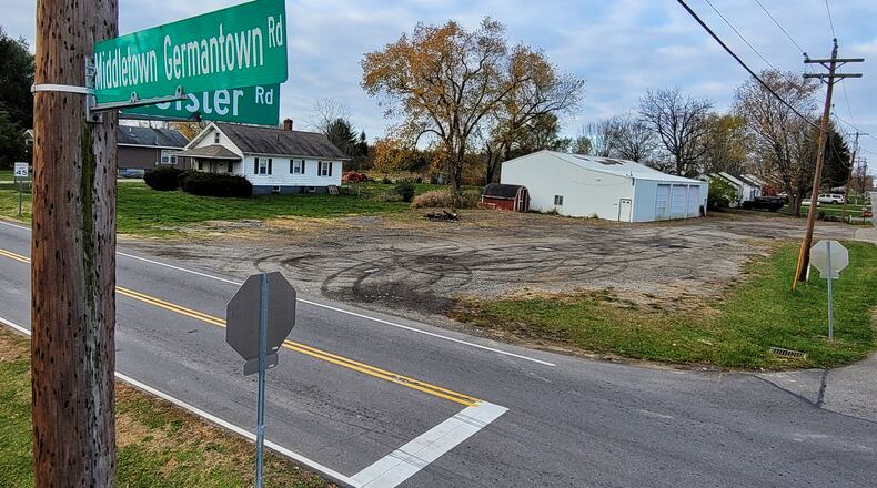 This land at the corner of Middletown Germantown Road and Keister Road in Madison Township could soon become a Dollar General store unless neighbors prevail in a federal lawsuit. NICK GRAHAM / STAFF