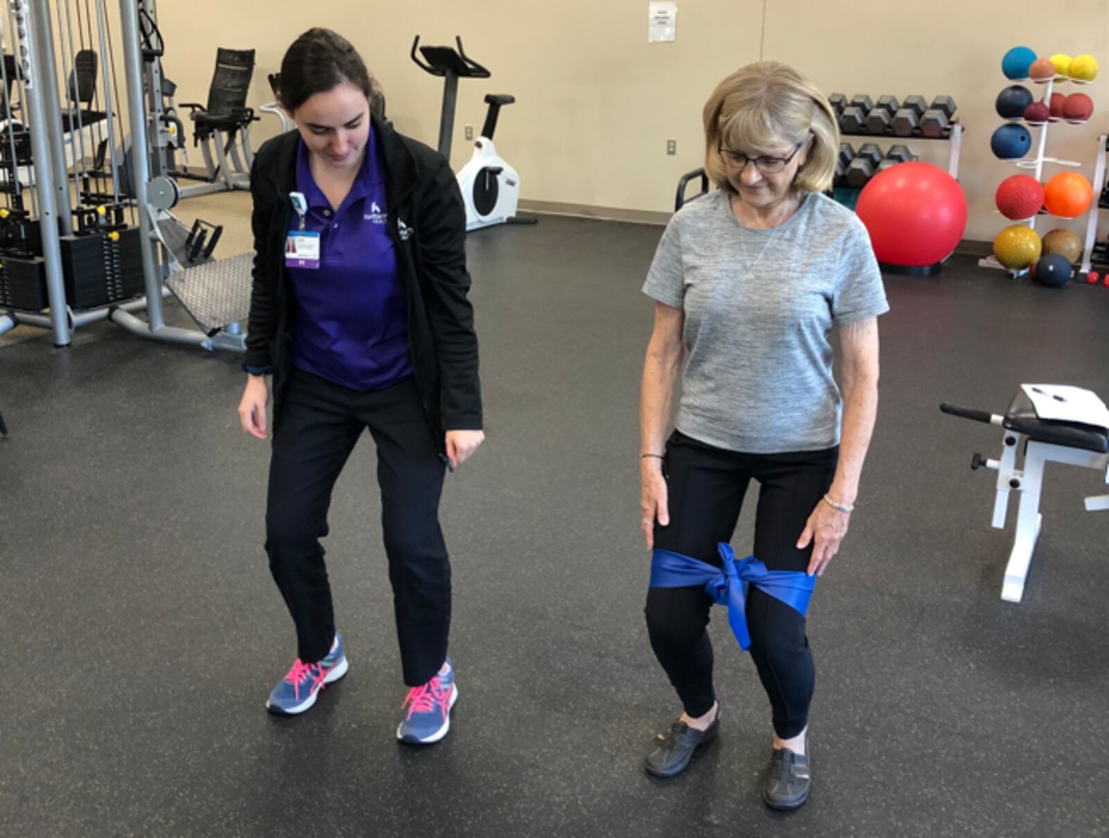 Physical therapist Julia Ward works with Sandy Stremel of Centerville. CONTRIBUTED