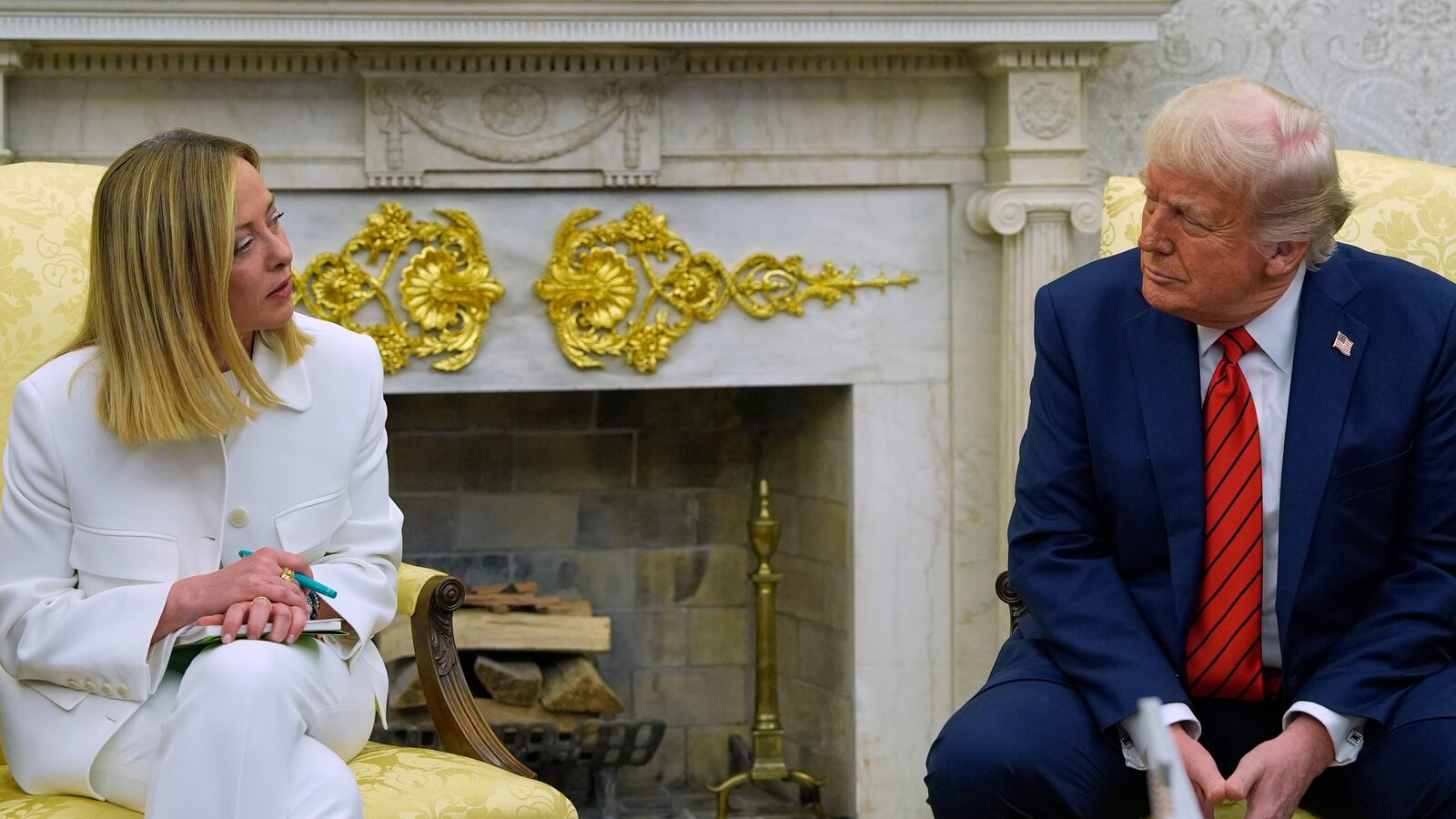 President Donald Trump meets with Italy's Prime Minister Giorgia Meloni in the Oval Office of the White House, Thursday, April 17, 2025, in Washington. (AP Photo/Alex Brandon)