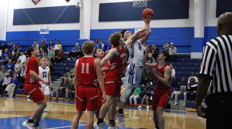 Middletown Christian's Jared Rose puts up a shot during a game this season. Rose became the school's all-time leading scorer this season. CONTRIBUTED