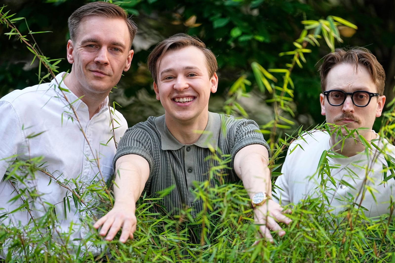 Swedish Eurovision contestants KAJ from Finland, Kevin Holmstrom, Jakob Norrgard and Axel Ahman, from left, pose for the camera before an interview with the Associated Press during the 69th Eurovision Song Contest week, in Basel, Switzerland, Thursday, May 15, 2025. (AP Photo/Martin Meissner)