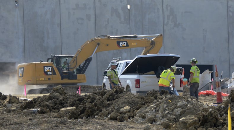 Koch Foods on Port Union Road in Fairfield is growing closer to completing its 400,000-square-foot expansion of its chicken processing facility. The company plans to hire 400 new jobs when it opens the new processing lines in February 2023, though some leadership position hiring is currently happening. The total project is $220 million, with $140 million spent on the new building. The remaining $80 million will be invested in new machinery and equipment. MICHAEL D. PITMAN/STAFF