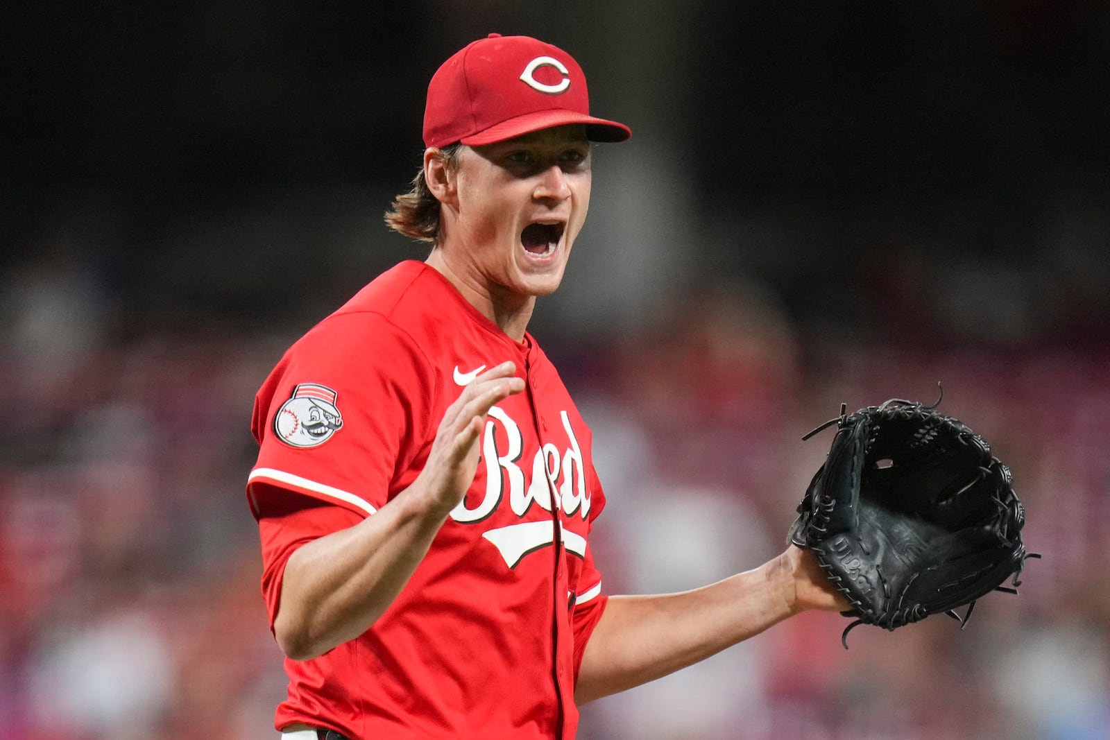 Cincinnati Reds pitcher Brady Singer reacts after striking out New York Mets' Brett Baty during the sixth inning of a baseball game, Saturday, Sept. 6, 2025, in Cincinnati. (AP Photo/Jeff Dean)