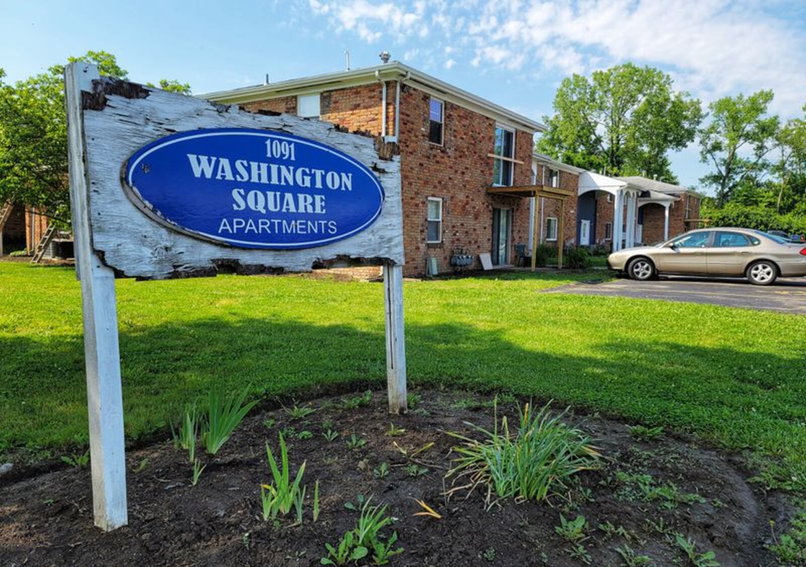 Police are investigating the shooting of two men Thursday night at an apartment complex in Hamilton’s Westside. NICK GRAHAM / STAFF