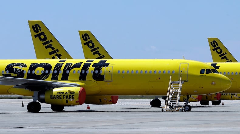 FLE - A line of Spirit Airlines jets sit on the tarmac at the Orlando International Airport on May 20, 2020, in Orlando, Fla. (AP Photo/Chris O'Meara, File)