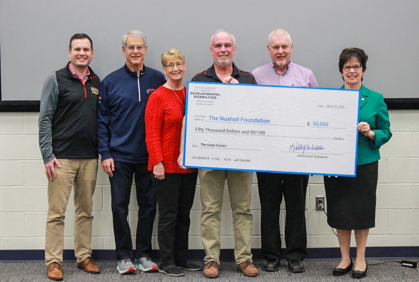 The Nuxhall Foundation recently received a gift of $50,000 towards our campaign to construct The Hope Center at the The Joe Nuxhall Miracle League Fields from The Butler County Board of Developmental Disabilities. The Hope Center is a 28,000 square foot indoor facility, which promises brand new recreational experiences in a variety of different sports. The donation comes from the Board's trust fund donated by the Schul Family. From left: Tyler Bradshaw, Executive Director of the Nuxhall Foundation, Larry Tischler, Vice Chair of the Nuxhall Foundation, Bonnie Nuxhall, board member of the Nuxhall Foundation, Kim Nuxhall, Volunteer President & Chairman of the Board of the Nuxhall Foundation, Dale French, President of the Butler County Board of Developmental Disabilities, and Lisa Guliano, Superintendent of the Butler County Board of Developmental Disabilities. CONTRIBUTED