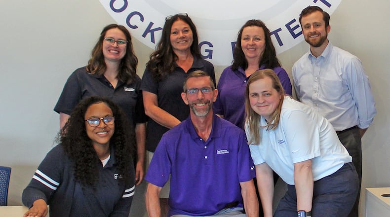 Employbridge local and regional staff members gathered this week for a ribbon-cutting ceremony at its new Fairfield location. Pictured are, front row, from left: Ty Craig, Robert Anneshensley, Angela Ziegler; back row: Sam Shrewsbery, Heather Sisbarro, Tracie Huston, Tim Devine Credit: Sue Kiesewetter