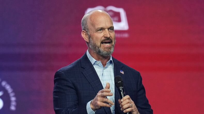 Kevin Roberts, president of The Heritage Foundation, speaks during Turning Point USA's AmericaFest 2025, Friday, Dec. 19, 2025, in Phoenix. (AP Photo/Ross D. Franklin)