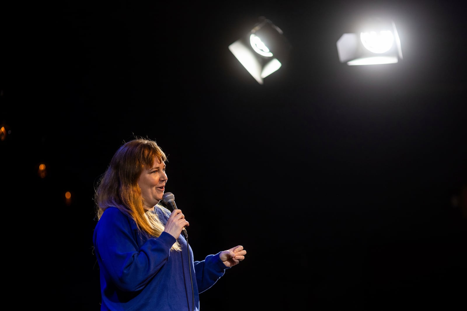 Ashley Brooke Roberts performs during Stand Up For Climate, a comedy show at Flappers Comedy on Thursday, March 20, 2025, in Burbank, Calif. (AP Photo/Ethan Swope)