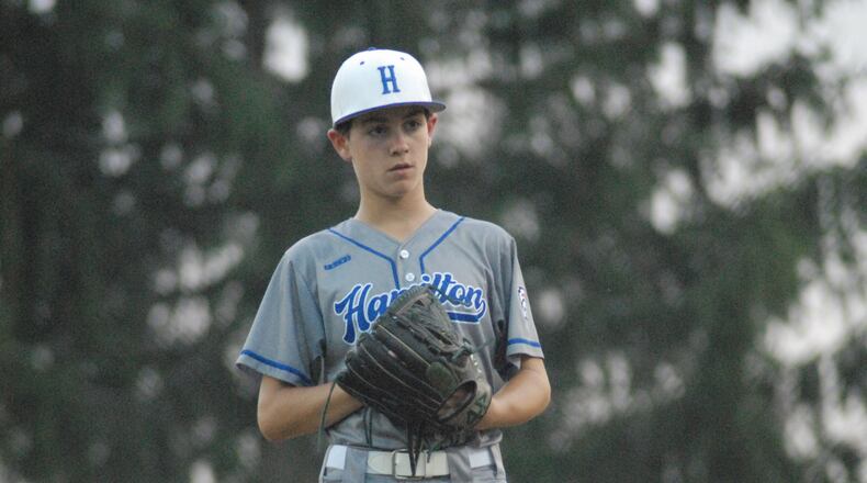 West Side's Ethan Woods prepares to send a pitch to the plate against New Albany on Wednesday at Centennial Park in Englewood. Chris Vogt/CONTRIBUTED