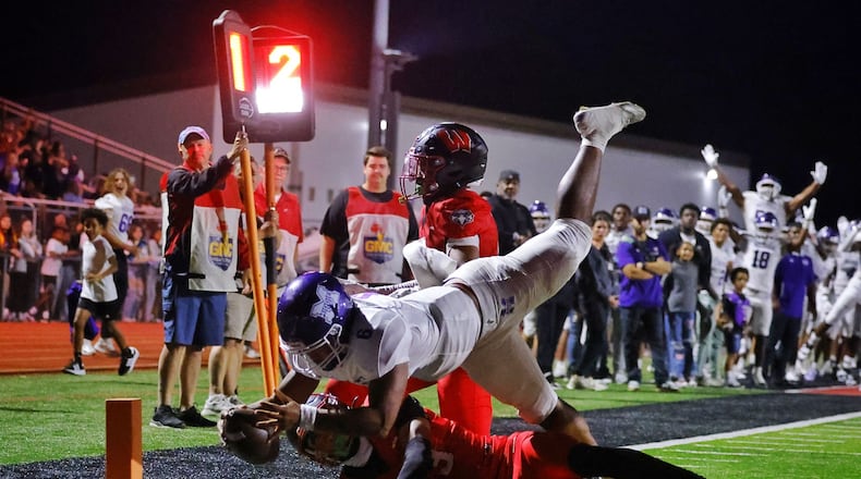 Middletown quarterback Joseph Ward dives for a touchdown during their football game against Lakota West Friday, Sept. 26, 2025 at Lakota West High School in West Chester Township. The Firebirds won 27-13 over the Middies. NICK GRAHAM/STAFF
