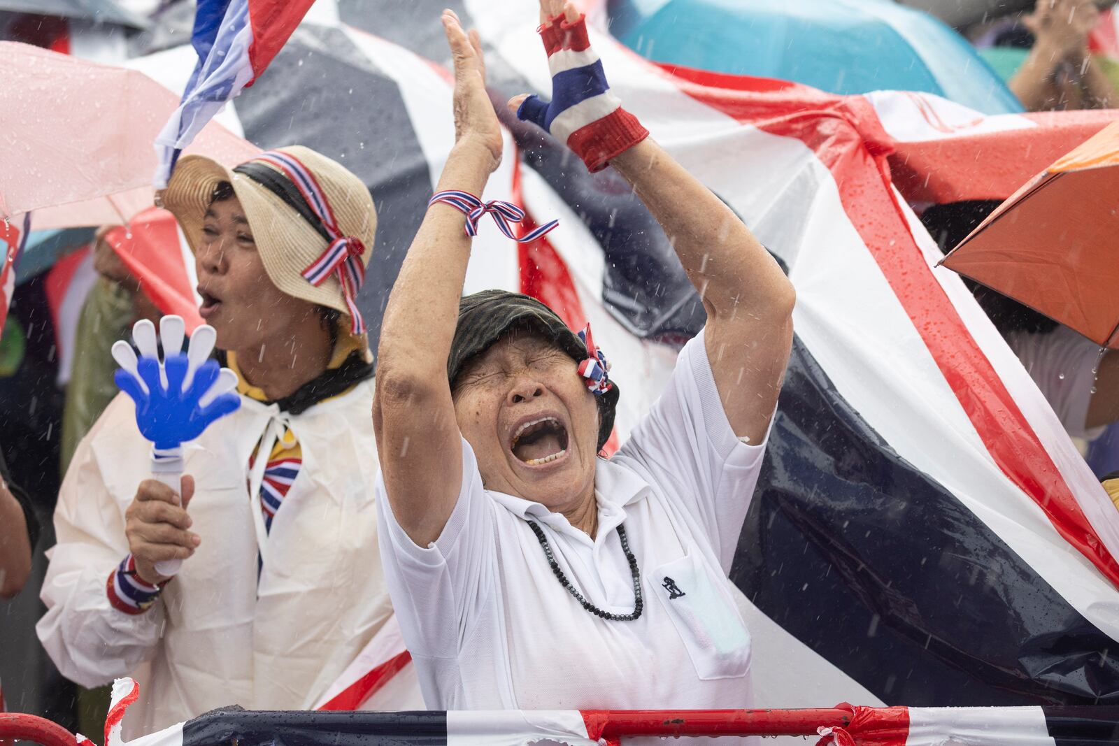 Protesters gather at Victory Monument demanding Thailand's Prime Minister Paetongtarn Shinawatra resign in Bangkok, Thailand, Saturday, June 28, 2025. (AP Photo/Wason Wanichakorn)