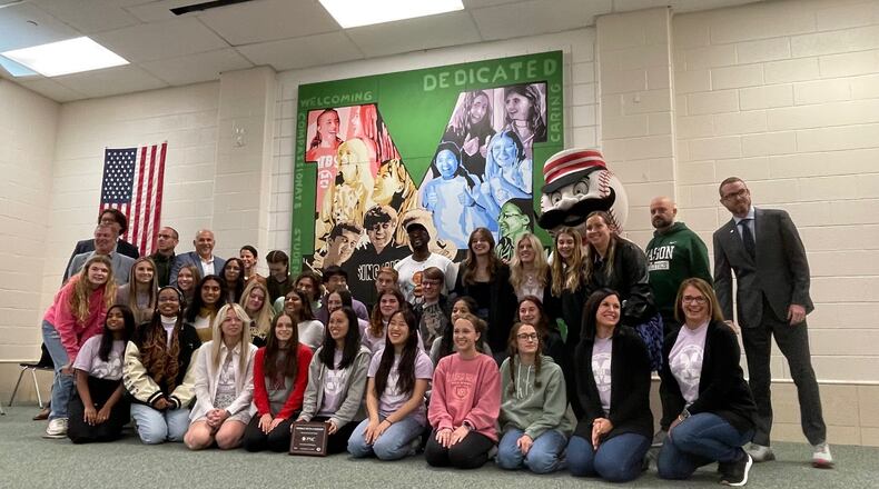 A new mural at Mason High School is intended to welcome new students. The mural was designed by artist Brent Billingsley in conjunction with members of Students Involving and Befriending Students, or SIBS. CONTRIBUTED