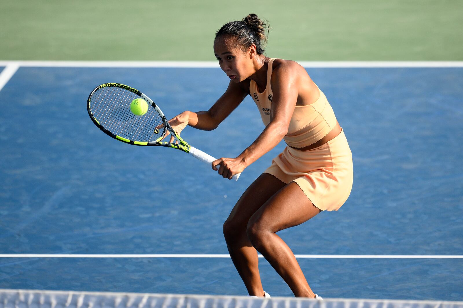 Leylah Fernandez, of Canada, returns the ball against Jessica Pegula during a match at the Citi Open tennis tournament Thursday, July 24, 2025, in Washington. (AP Photo/Nick Wass)