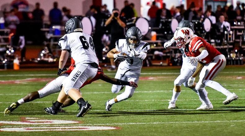 Lakota East’s Jeff Garcia (1) finds running room during a 35-0 victory at Lakota West on Sept. 29. NICK GRAHAM/STAFF