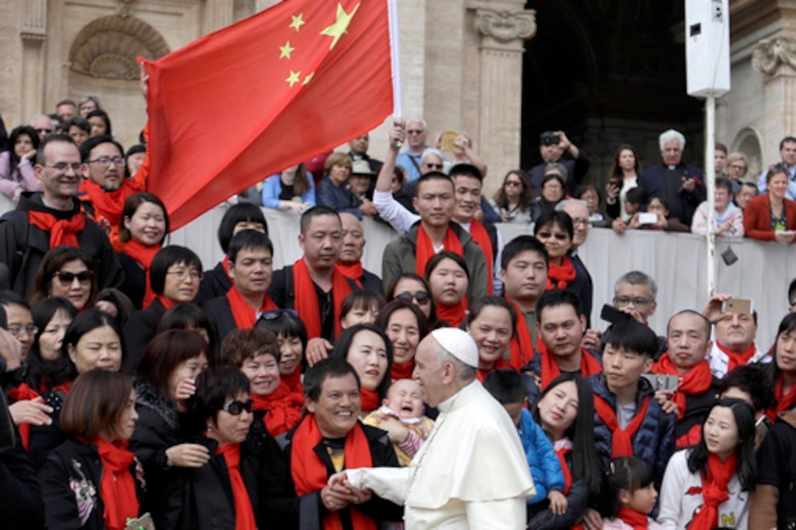 FILE - Pope Francis meets a group of faithful from China at the end of his weekly general audience in St. Peter's Square at the Vatican on April 18, 2018. (AP Photo/Gregorio Borgia, File)