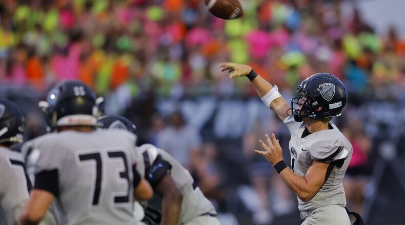 Lakota East quarterback TJ Kathman tossed three touchdown passes in a 49-7 win over Middletown on Friday, Sept. 3, 2020. Nick Graham/STAFF