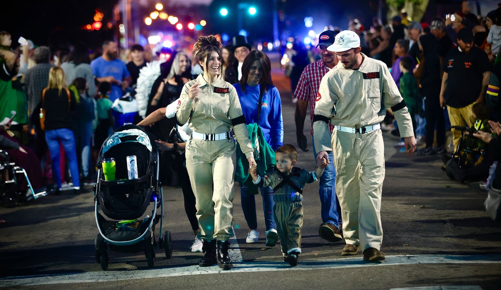 Halloween decorations and costumes area already in stories. A couple and their child enjoy the annual Fairborn Halloween Festival held every October in downtown Fairborn. STAFF