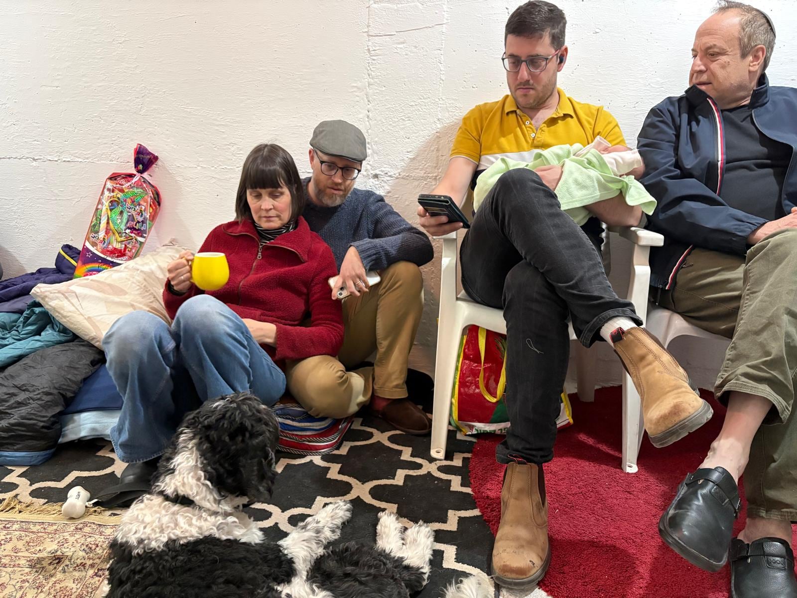 Friends, family and pets at an apartment in Jerusalem where Dayton Daily News Writer Meredith Moss is visiting spend time in a bomb shelter as missile sirens ring March 1, 2026. CONTRIBUTED