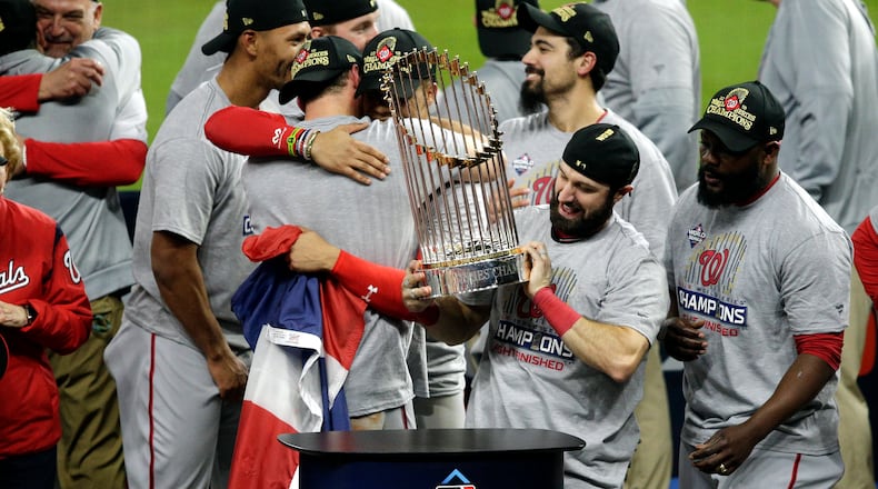 HOUSTON, TEXAS - OCTOBER 30:  Adam Eaton #2 of the Washington Nationals holds the Commissioners Trophy after defeating the Houston Astros 6-2 in Game Seven to win the 2019 World Series in Game Seven of the 2019 World Series at Minute Maid Park on October 30, 2019 in Houston, Texas. (Photo by Bob Levey/Getty Images)