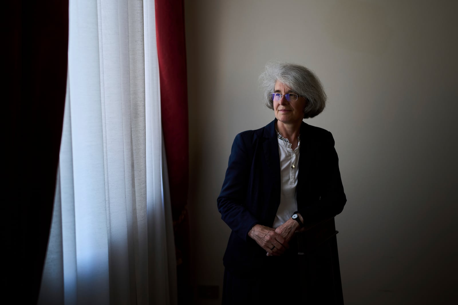 Sister Nathalie Becquart walks inside the General Secretariat of the Synod in Rome on Saturday, May 10, 2025. (AP Photo/Bernat Armangue)
