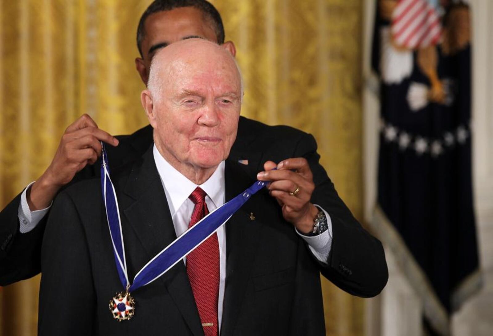 Former astronaut and former U.S. Sen. John Glenn (D-OH) is presented with a Presidential Medal of Freedom by U.S. President Barack Obama during an East Room event May 29, 2012 at the White House in Washington, DC. (Alex Wong/Getty Images)