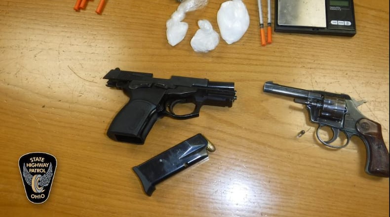 Drugs, needles and a pair of loaded handguns were seized during a traffic stop in Middletown by Ohio Highway Patrol troopers. CONTRIBUTED