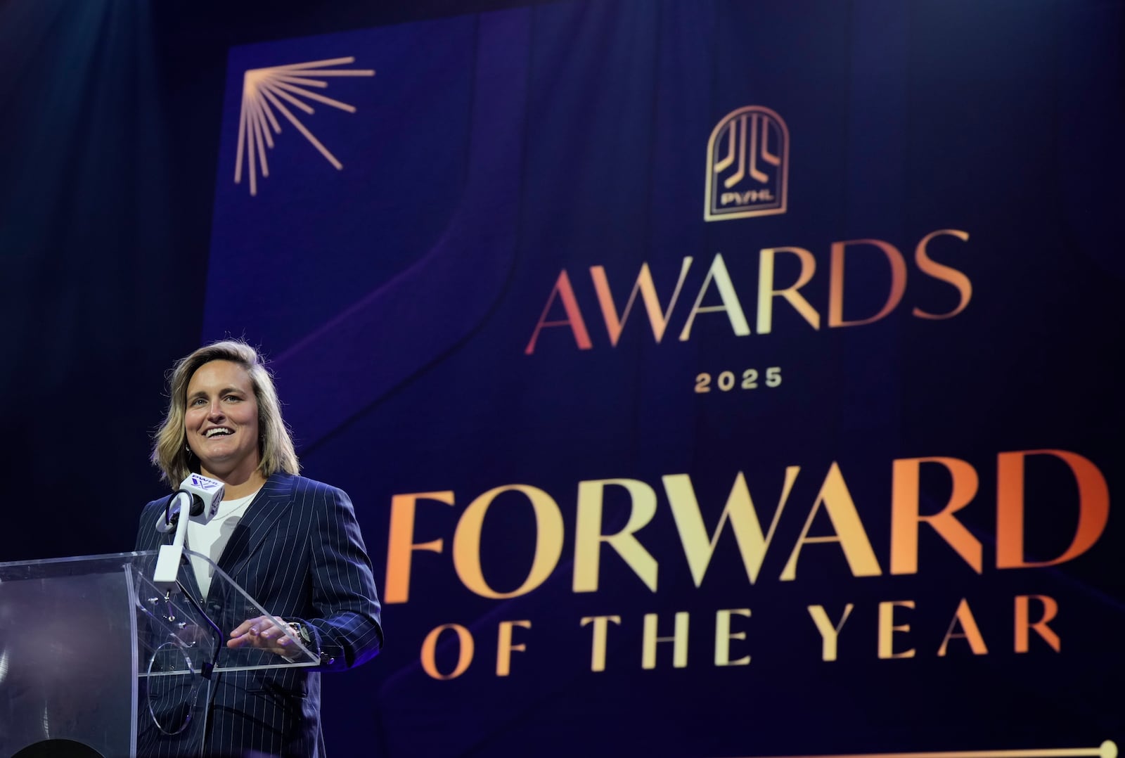 Montreal Victoire forward Marie-Philip Poulin speaks after being named as the Forward of the Year during the PWHL women's hockey awards in Ottawa, Ontario,, Wednesday June 25, 2025. (Adrian Wyld/The Canadian Press via AP)