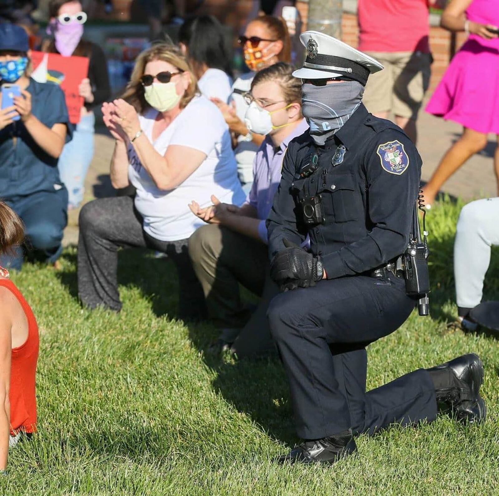 A peaceful protest was held June 2 at the West Chester Clock Tower. Even asked by protesters, some West Chester officers dropped to one knee. GREG LYNCH / STAFF