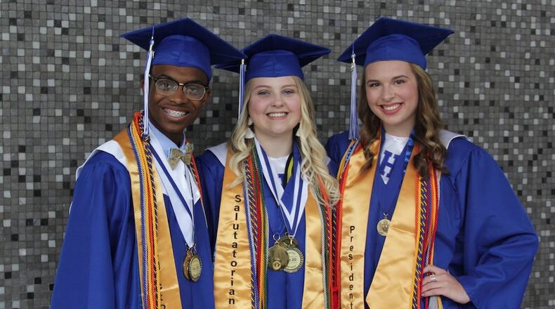 Hamilton High School valedictorian, Daniel Sutton, will be attending Duke University and he is one of 300 top student leaders in the nation to receive the prestigious Gates Scholarship. Sutton, left, is pictured at Hamilton’s recent commencement ceremony with salutatorian Allison Sharp and class president Jadyn Hendershot.