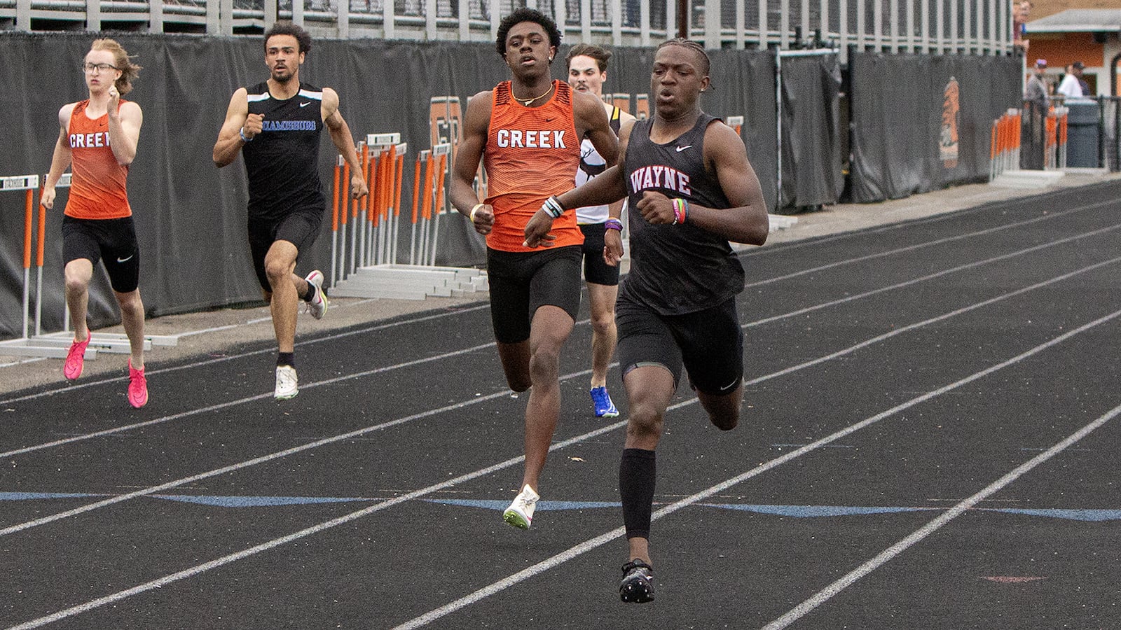 Wayne freshman Jamier Averette-Brown wins the 200 meters in 21.49 seconds at the GWOC meet Wednesday at Beavercreek High School. Jeff Gilbert/CONTRIBUTED