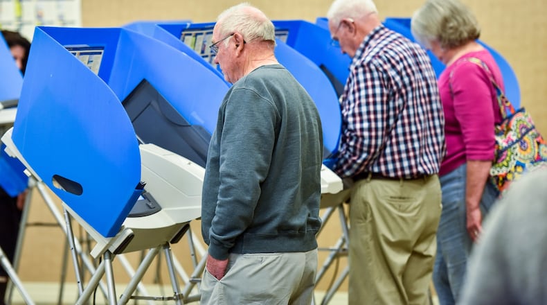 Early voting for the Nov. 8 general election begins on Wednesday at the Butler County Board of Elections office on Princeton Road. Pictured are voters casting early votes on March 14 in advance of the March 15 primary this past spring. NICK GRAHAM/FILE PHOTO