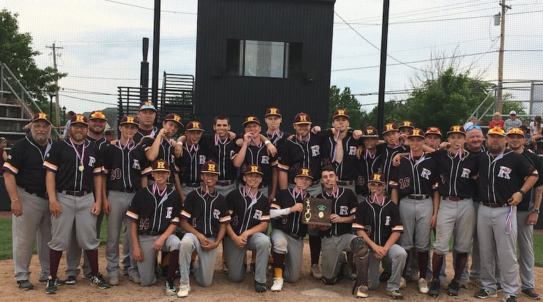 The Ross Rams pose with their hardware Monday at Mason after beating Tippecanoe 6-3 to repeat as Division II district champions. RICK CASSANO/STAFF