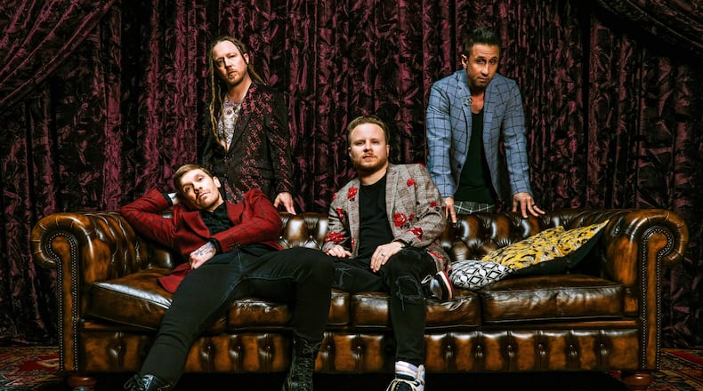 Shinedown, (left to right) Brent Smith, Barry Kerch, Zach Myers and Eric Bass, performs at Fraze Pavilion in Kettering, on Tuesday, Aug. 10. The group made Billboard history in August 2020 by being the first act in its 40-year run to have 16 number one singles on the Mainstream Rock Songs airplay chart.