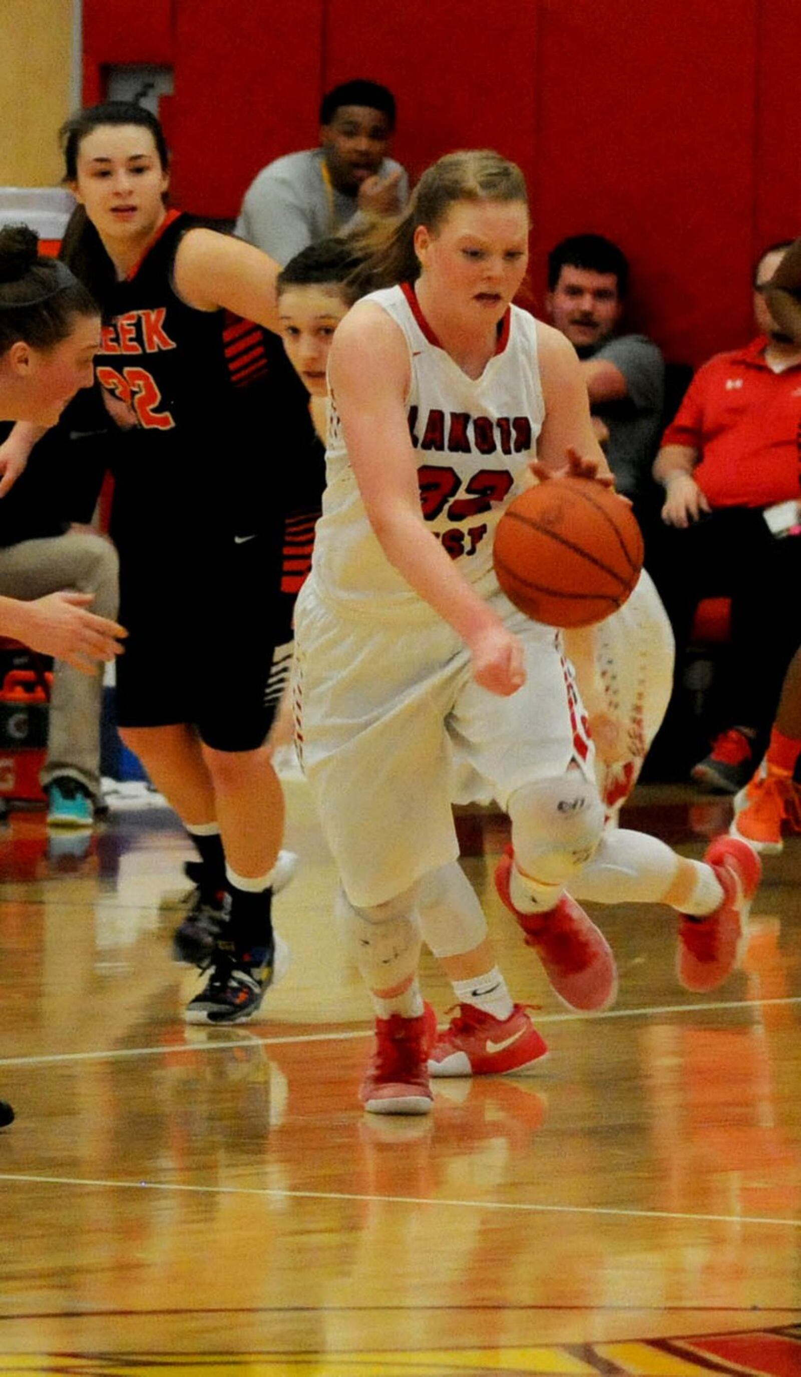 Lakota West’s Abby Prohaska (32) comes up with a steal in the closing minutes of Saturday’s Division I district final against Beavercreek at Princeton. CONTRIBUTED PHOTO BY DAVID A. MOODIE
