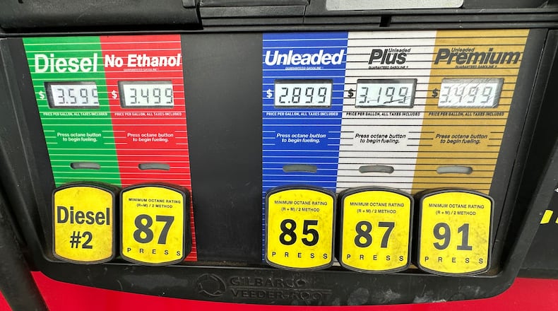 Gas prices are displayed over various grades available at a pump at a QuikTrip gas station, Tuesday, March 3, 2026, in Greenwood Village, Colo. (AP Photo/David Zalubowski)