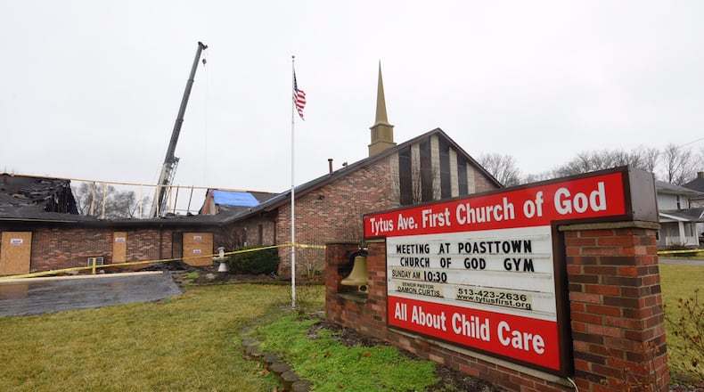 Cleanup continued Monday, Jan. 23, 2017, after a fire in the early morning hours of Sunday, Jan. 22, ravaged a portion of Tytus Avenue First Church of God in Middletown. NICK GRAHAM/STAFF