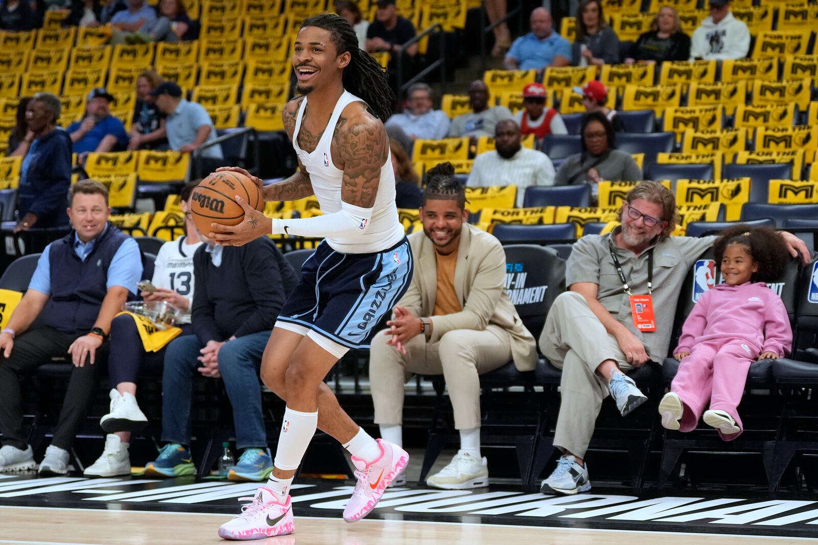 Memphis Grizzlies guard Ja Morant warms up before an NBA play-in tournament basketball game against the Dallas Mavericks, Friday, April 18, 2025, in Memphis, Tenn. (AP Photo/George Walker IV)