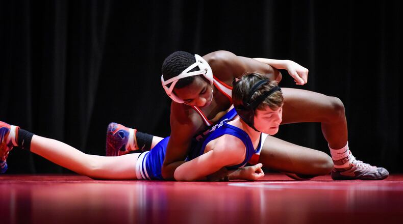Fairfield’s Moustapha Bah is en route to a 106-pound victory over Springboro’s Michael Gust during a dual Jan. 19, 2017, at Fairfield’s Performing Arts Center. NICK GRAHAM/STAFF