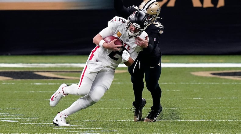 New Orleans Saints defensive end Trey Hendrickson (91) sacks Atlanta Falcons quarterback Matt Ryan (2) in the first half of an NFL football game in New Orleans, Sunday, Nov. 22, 2020. (AP Photo/Butch Dill)