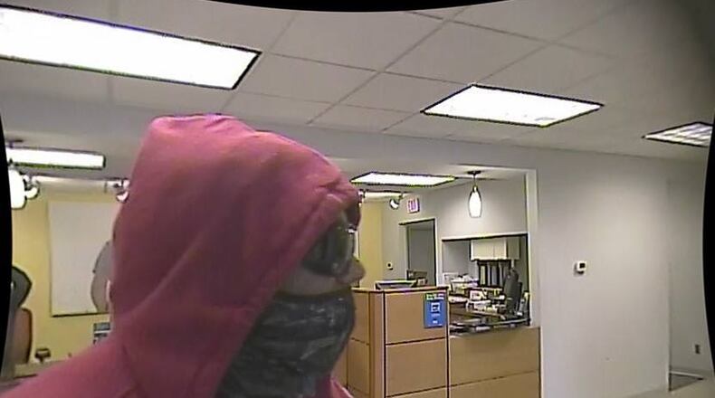A bank robber, described as a light-skinned black male by witnesses, stole an undisclosed amount of cash from First Financial Bank on South Gilmore Road in Fairfield.